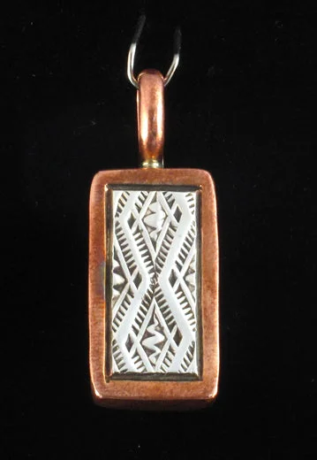 Track lighting for rental propertiesLasso Snake Silver & Copper Pendant