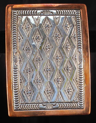 Track lighting for creating a focal pointMedicine Man Moons Silver & Copper Belt Buckle Track lighting for creating a focal pointMedicine Man Moons Silver & Copper Belt Buckle