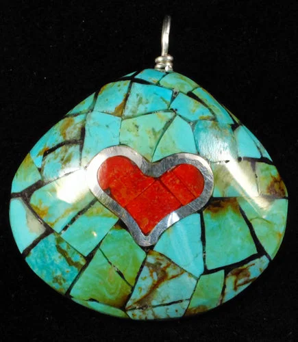 Track lighting for creating a moody atmosphereShell Pendant, Style 4