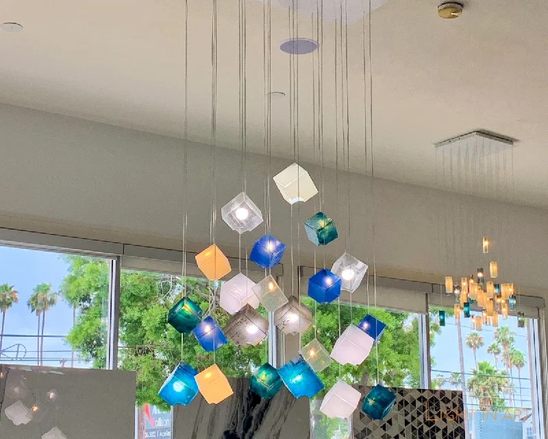 Chandeliers with Frosted Glass for a Softer Light DiffusionChandeliers with Frosted Glass for a Softer Light DiffusionNoga Noya Pendants