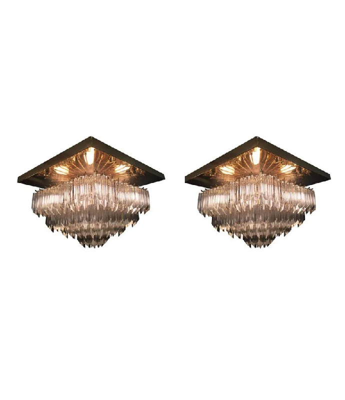Victorian - Inspired Chandeliers with Ornate DetailsVictorian - Inspired Chandeliers with Ornate DetailsPAIR OF VENINI CRYSTAL CHANDELIERS ON GOLD-PLATED FRAMES