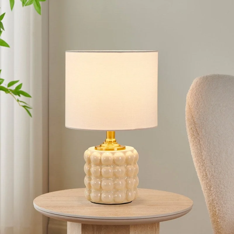 leather table lamps with a distressed texture for a rugged charmleather table lamps with a distressed texture for a rugged charmKAWOTI 14.75 in. Cream Cracked Texture Ceramic Table Lamp with White Shade - W9" * H14.75"