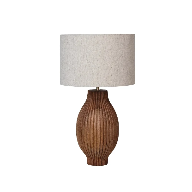 metal table lamps with a matte black finish for a sleek appearancemetal table lamps with a matte black finish for a sleek appearanceWalnut Whisper Carved Mango Wood Lamp